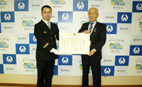 写真：大川浩司さんと尾崎市長