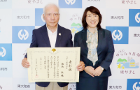 写真:山本弘さん(左)